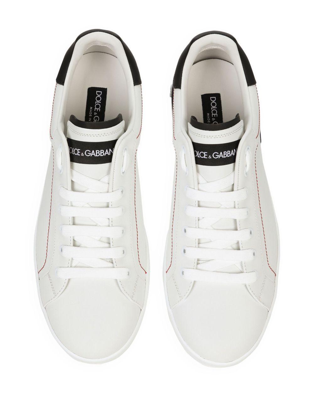 DOLCE e GABBANA Sneakers Portofino in pelle bianca con inserti neri
