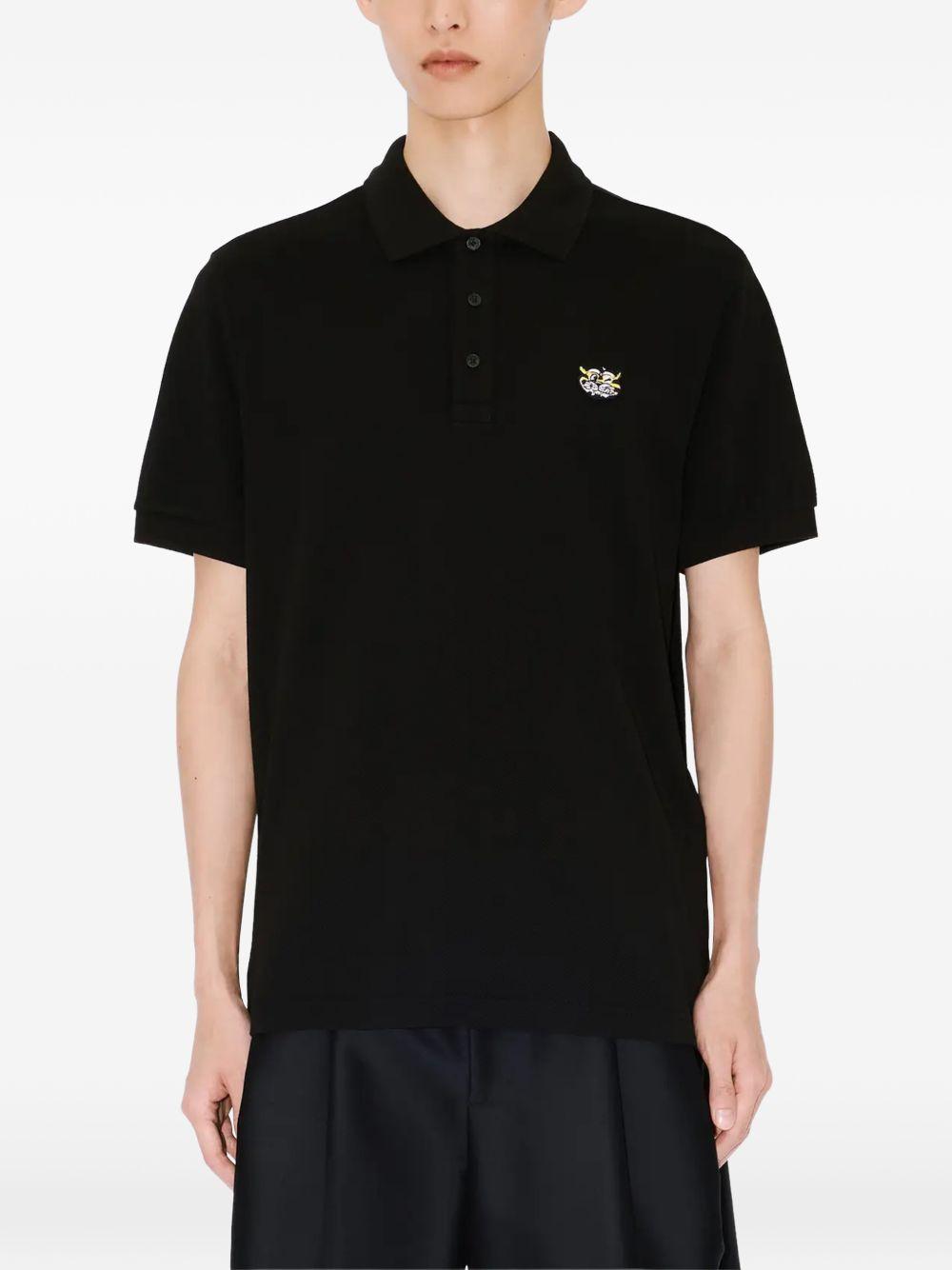 KENZO Polo nera in cotone con logo cucito