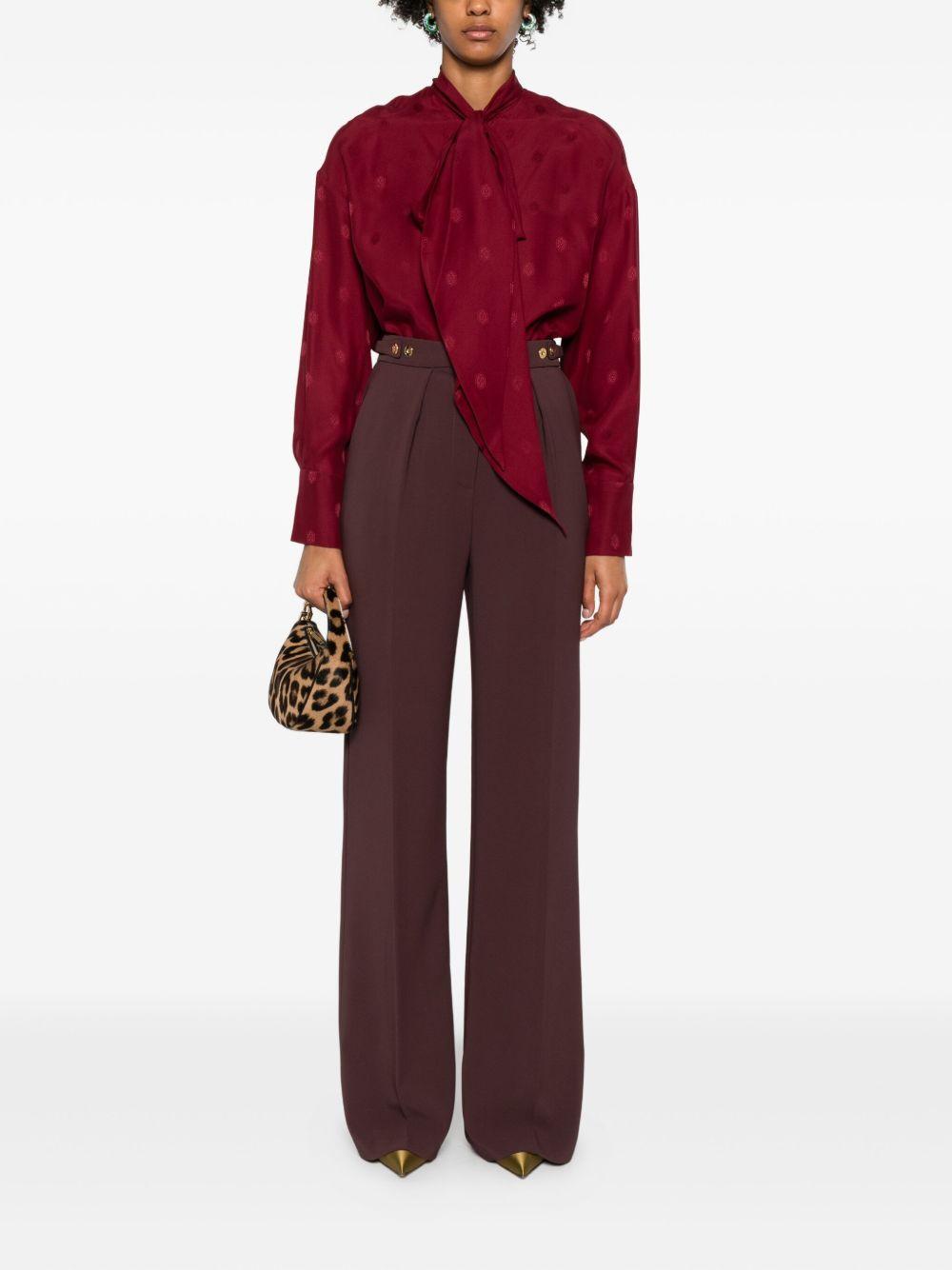 ELISABETTA FRANCHI Pantaloni casual bordeaux con bottoni dorati