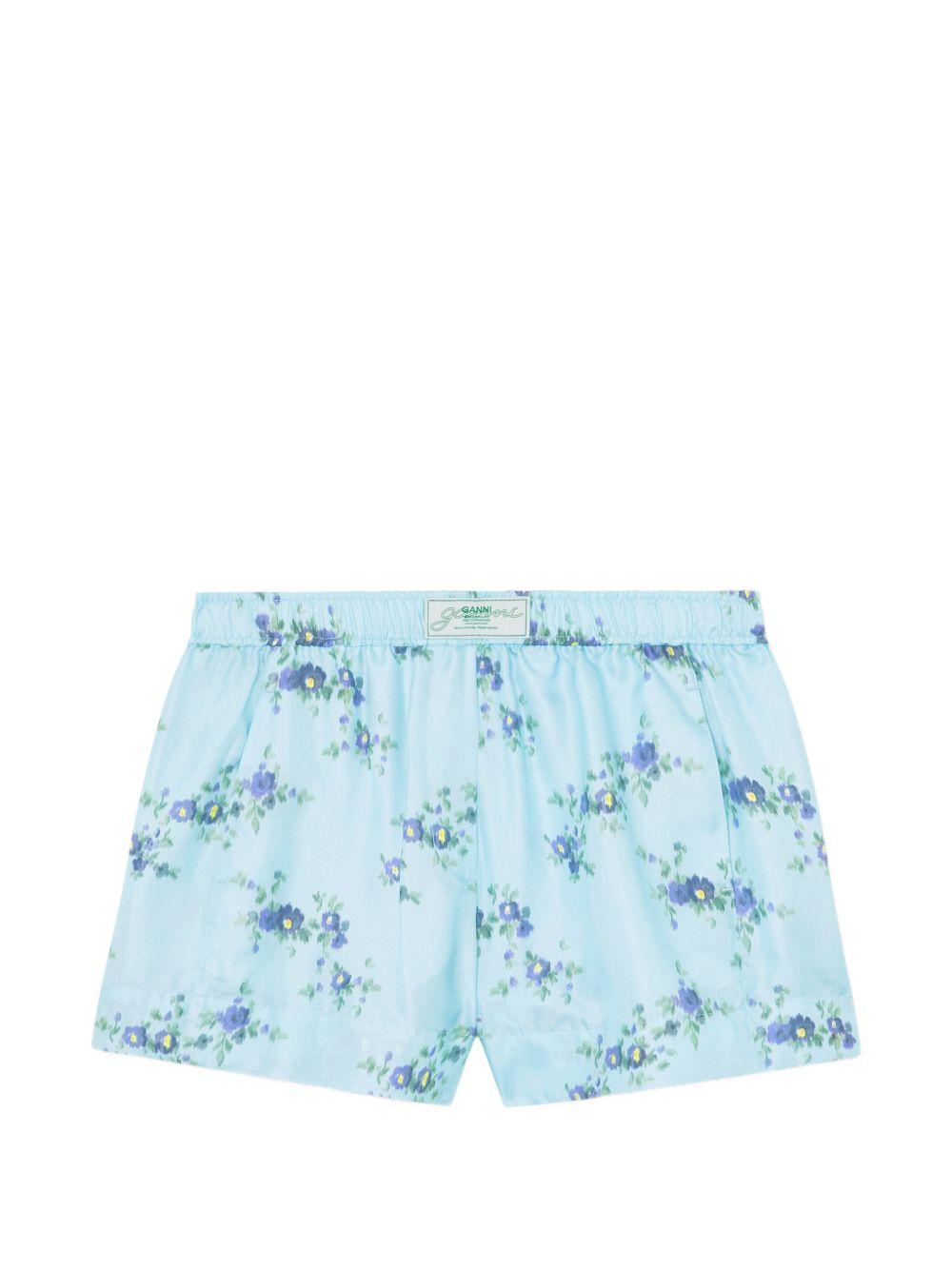 GANNI Short in seta azzurro con fantasia floreale