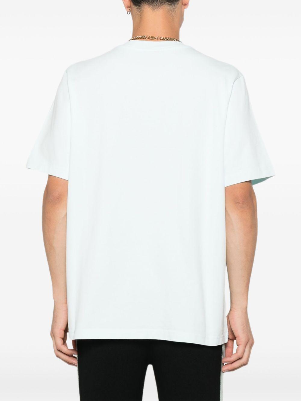 CASABLANCA T-shirt a manche corte in cotone azzurro con stampa grafica