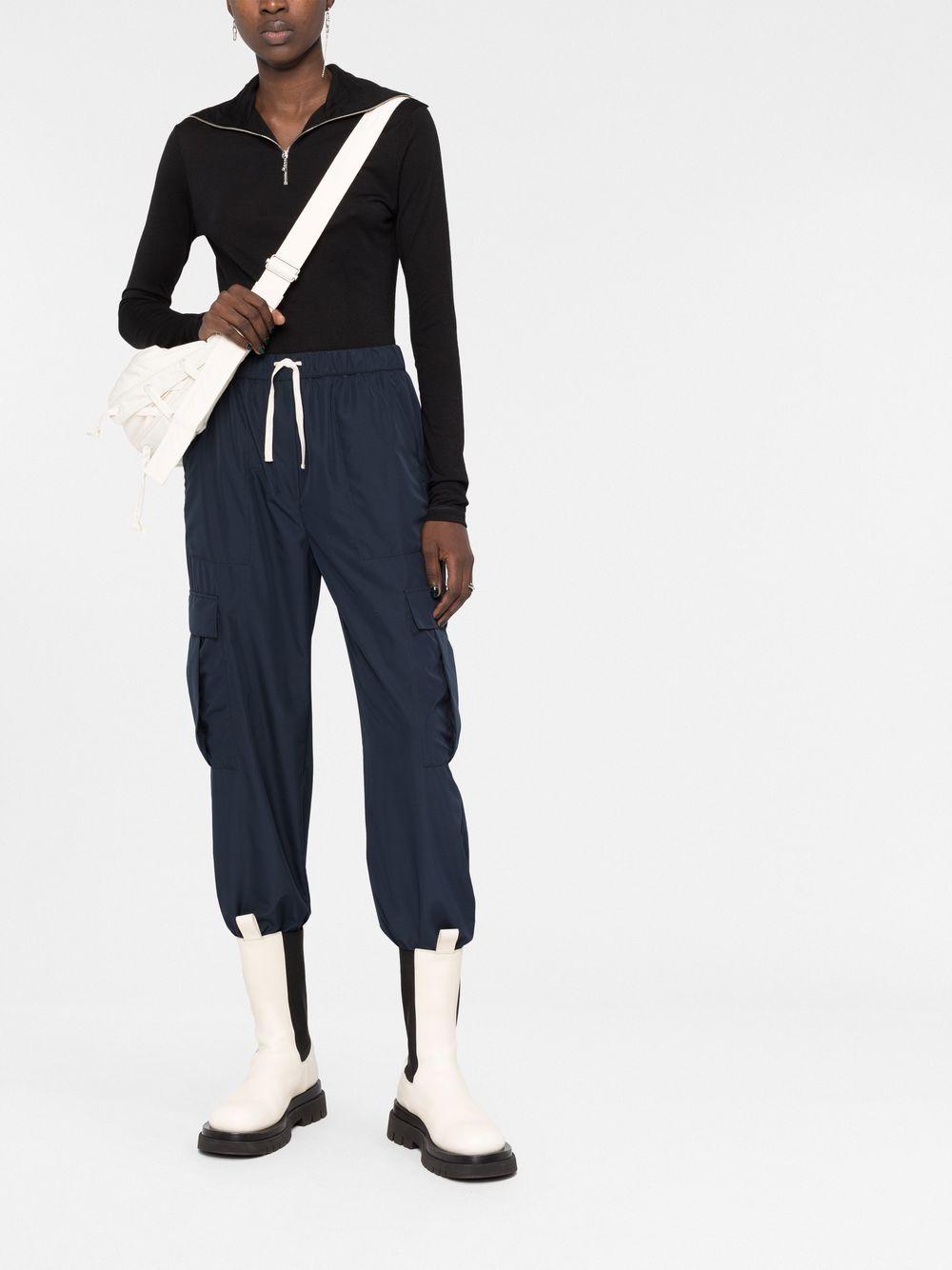 JIL SANDER Top a maniche lunghe con zip