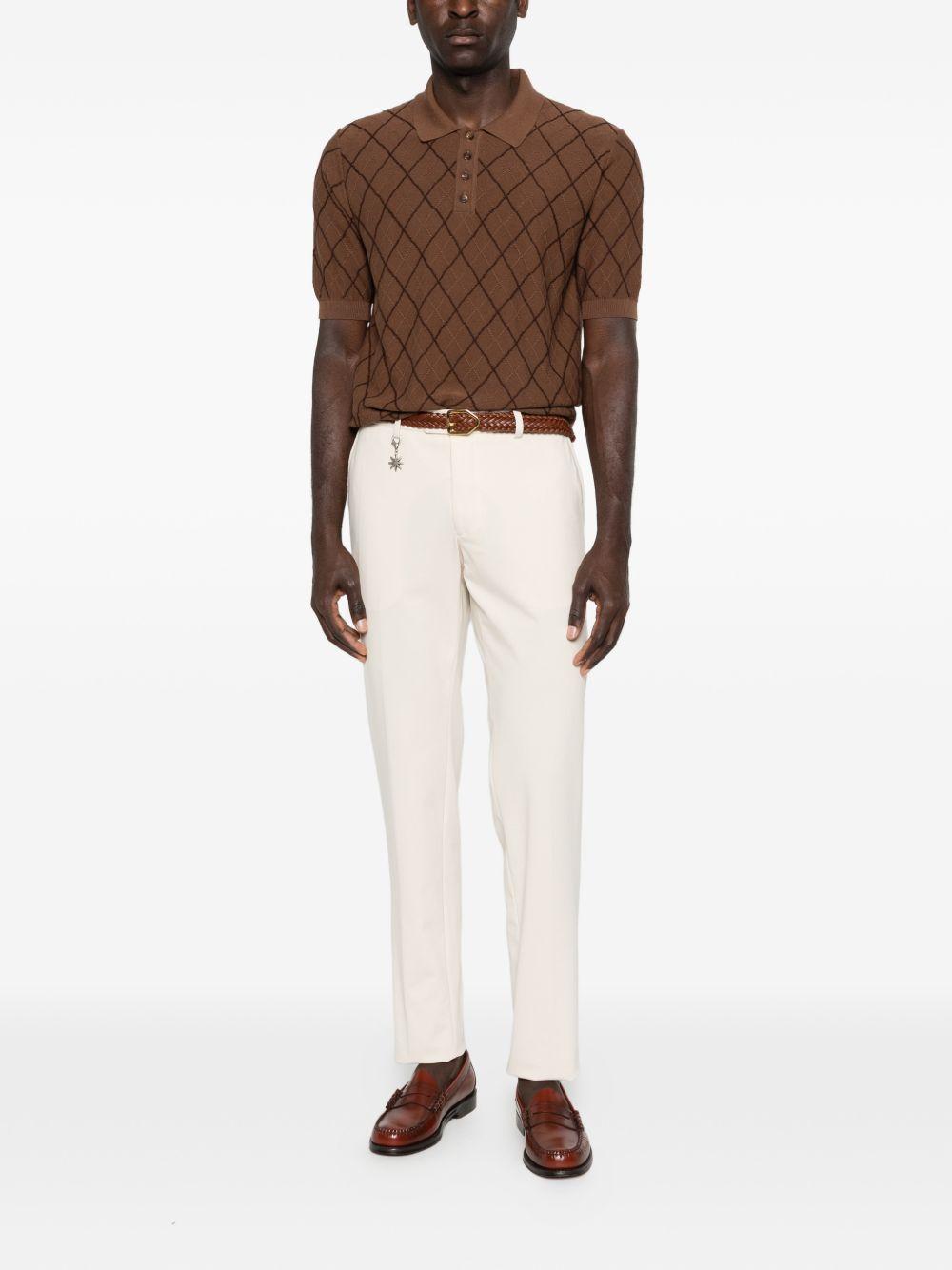 RAKKI Polo marrone The Legend Paul Newman 1956