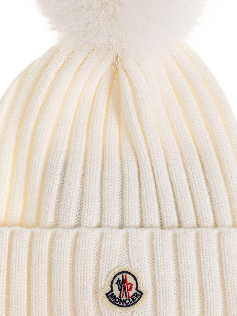 MONCLER Berretto con pon pon e logo