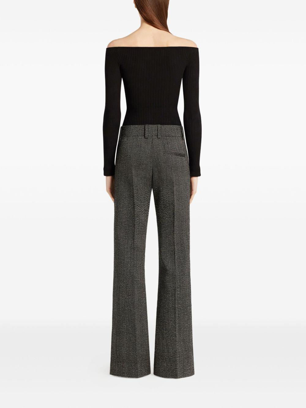 COURREGES Top con scollo bardot nero con logo