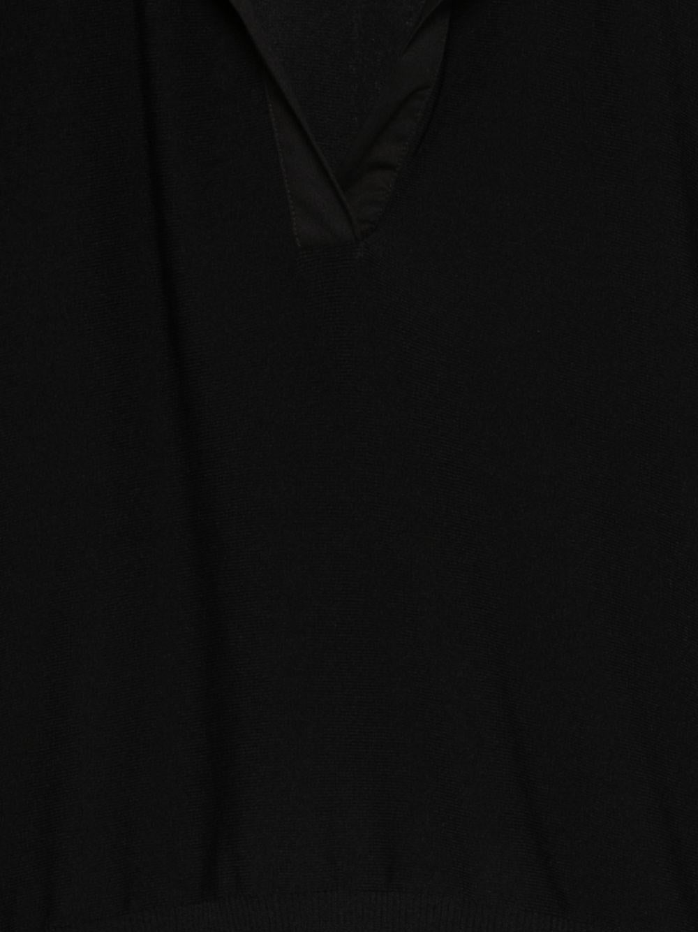 D EXTERIOR Polo nera a maniche corte