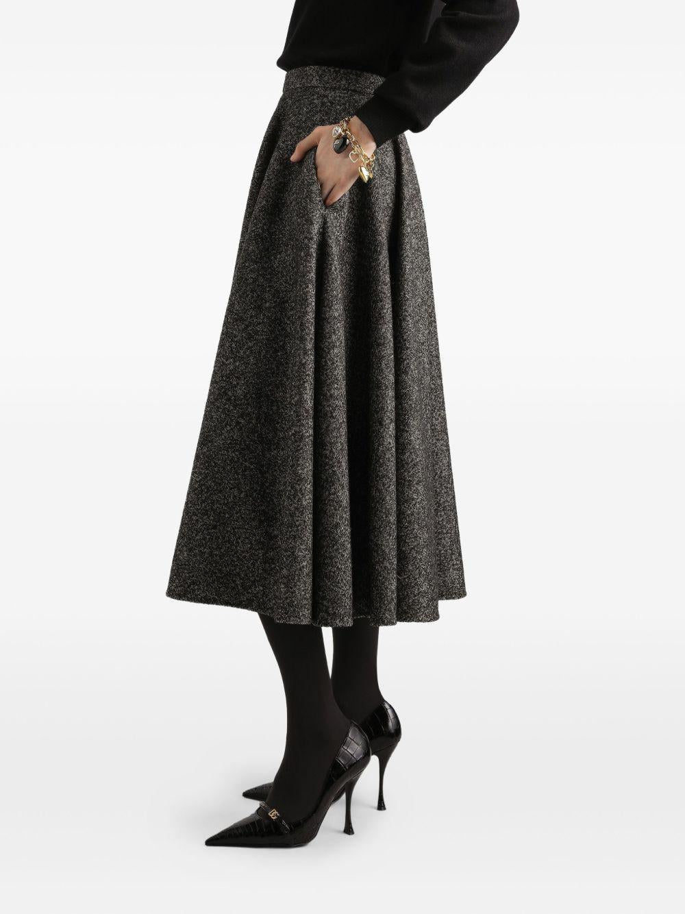 DOLCE e GABBANA Gonna midi a ruota in puntinato misto lana