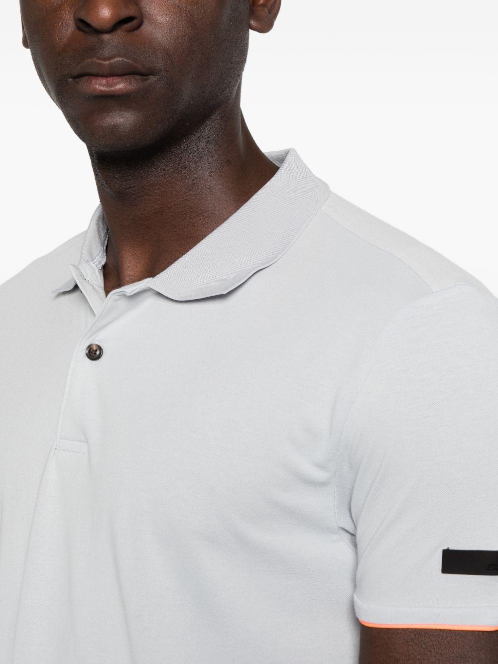 RRD ROBERTO RICCI DESIGNS Polo grigia a maniche corte con patch logo sul petto