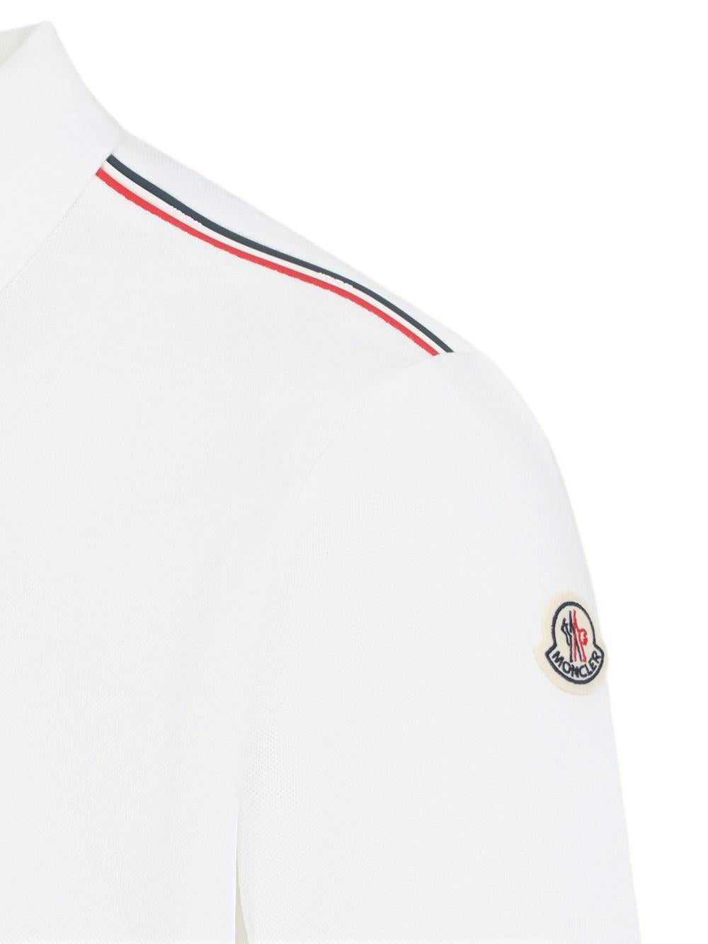 MONCLER Polo bianca a righe in cotone