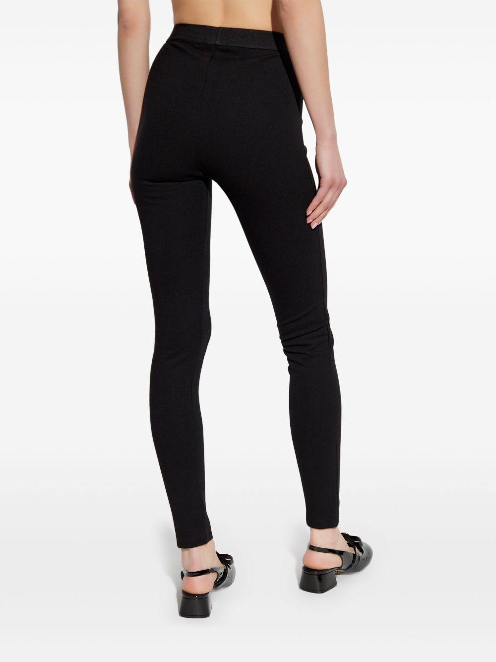 VERSACE Leggings neri con elastico in vita con logo