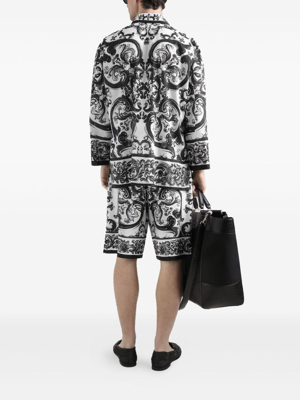 DOLCE e GABBANA Pantaloni in twill di seta stampa Maiolica