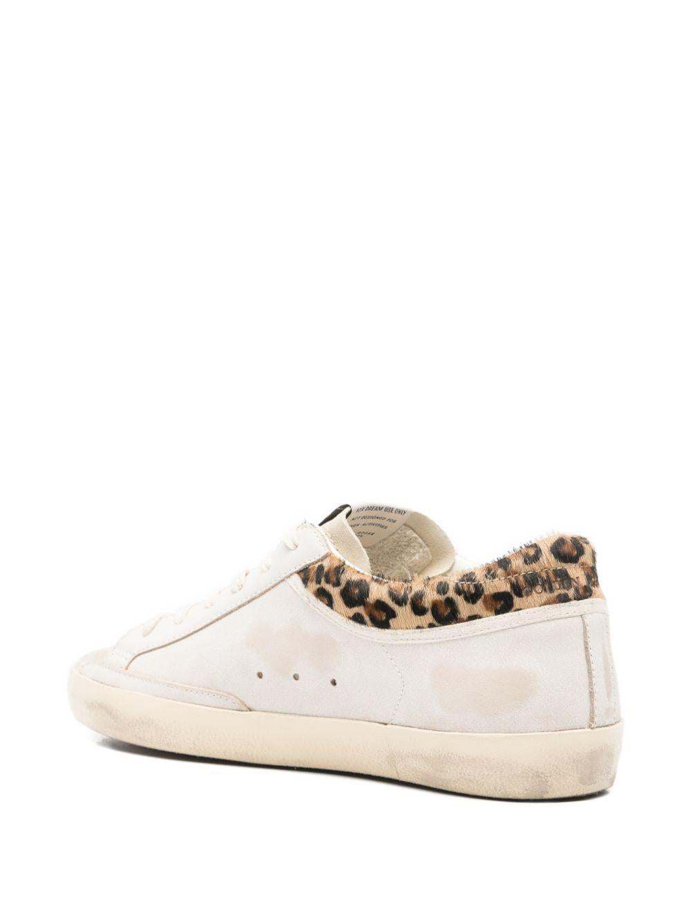 GOLDEN GOOSE Sneakers Super-Star in pelle effetto consumato con bordo in cavallino stampa leopardo