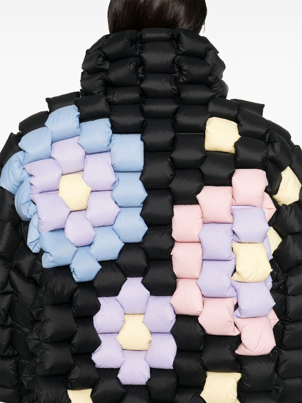 RAXXY Piumino nero con design imbottito a intreccio 3D