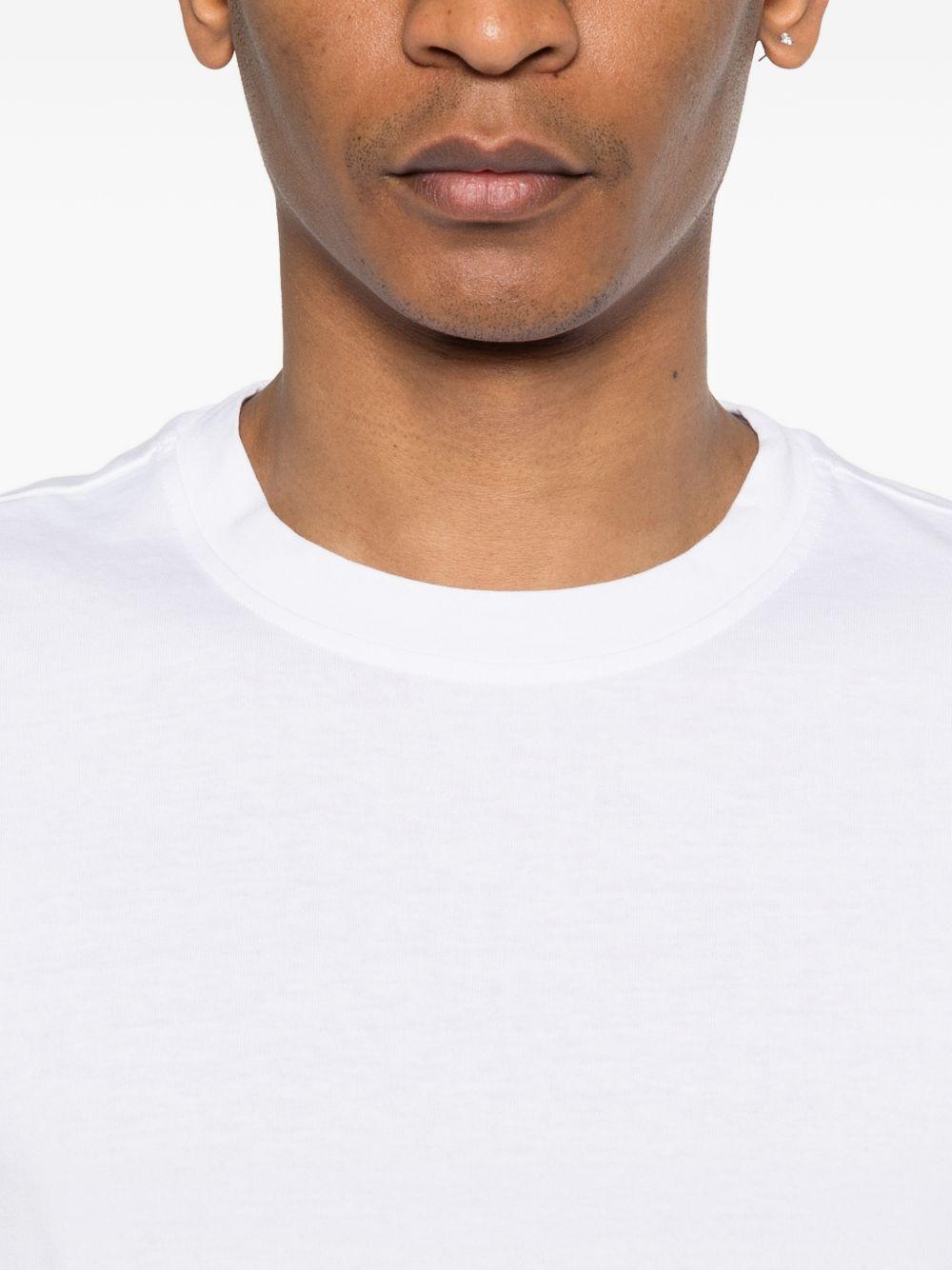 SCAGLIONE T-shirt in cotone bianco a maniche corte