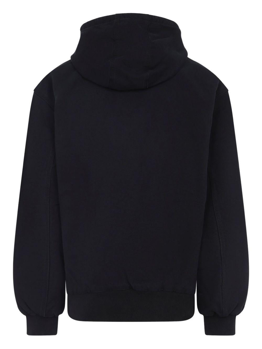 CARHARTT WIP Giubbotto nero con cappuccio e zip