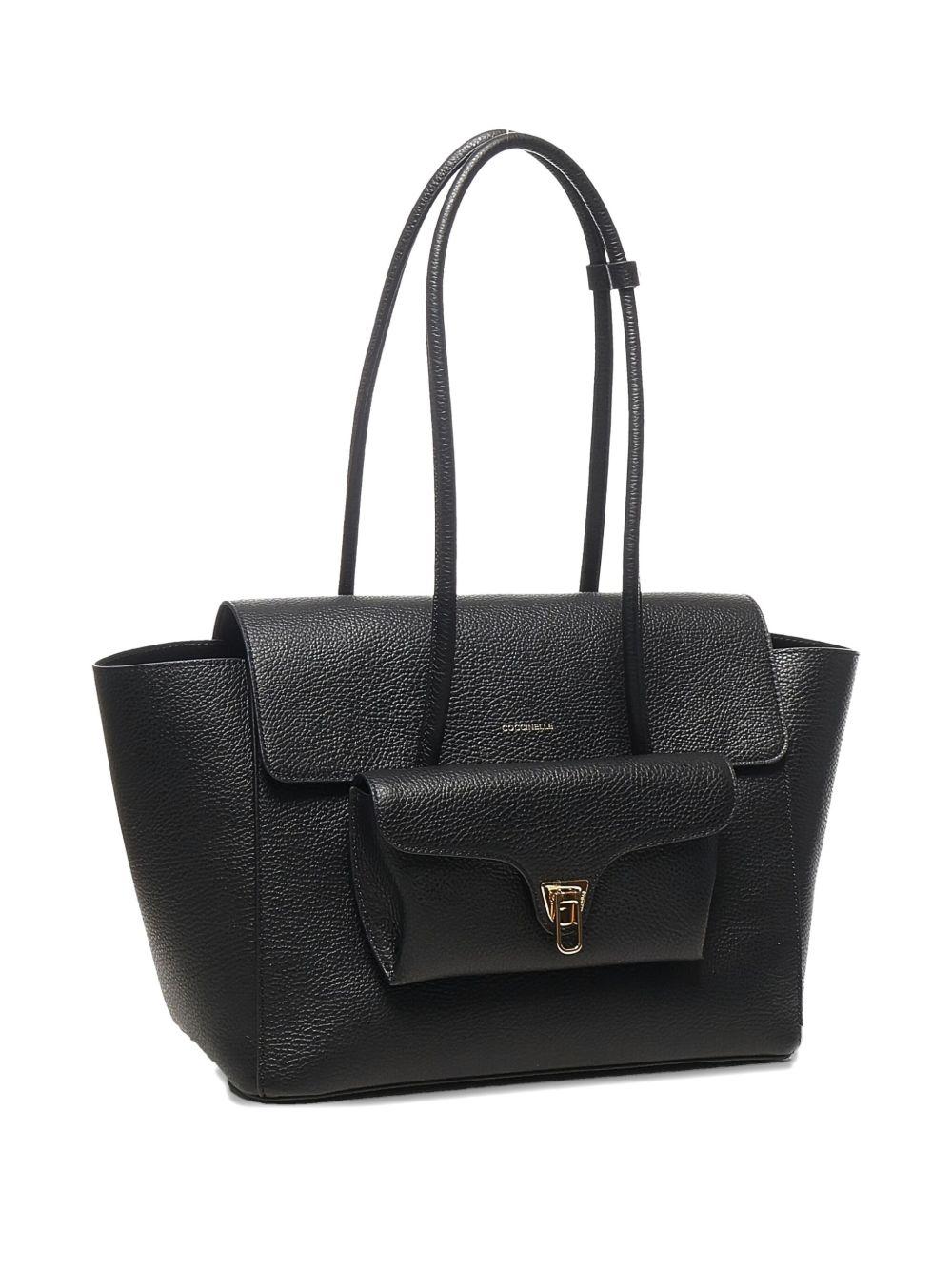 COCCINELLE Borsa in pelle nera con silhouette a trapezio