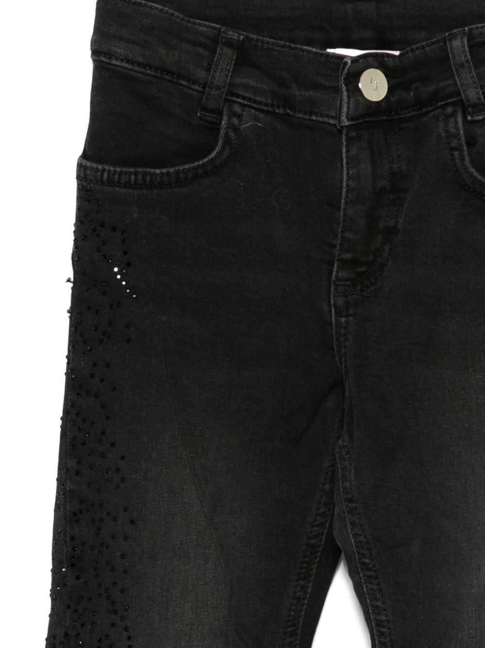 LIUJO Jeans neri con applicazioni di strass