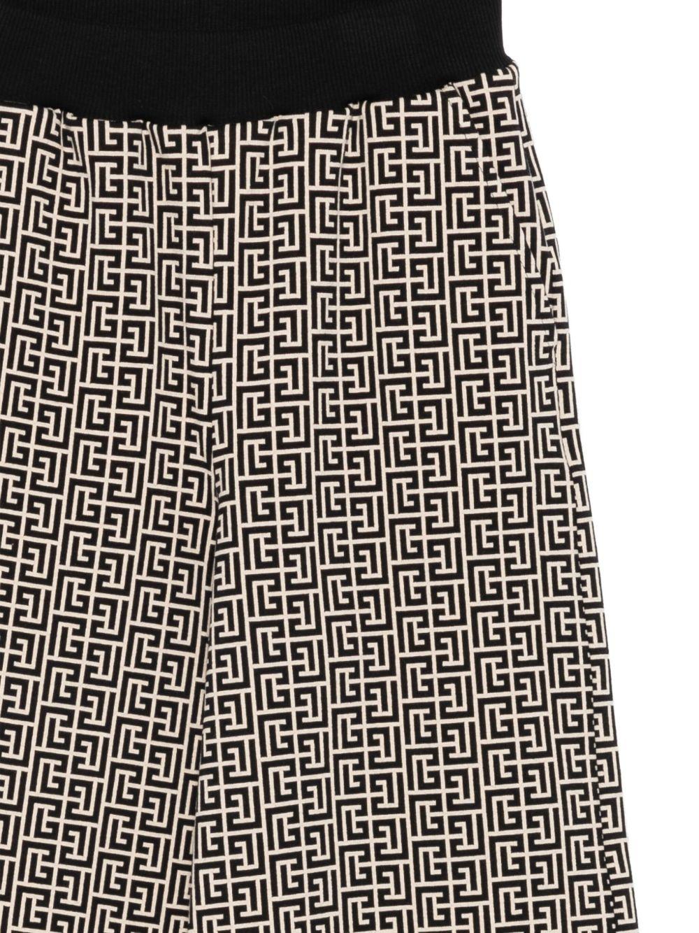 BALMAIN Pantaloni con monogramma beige e nero