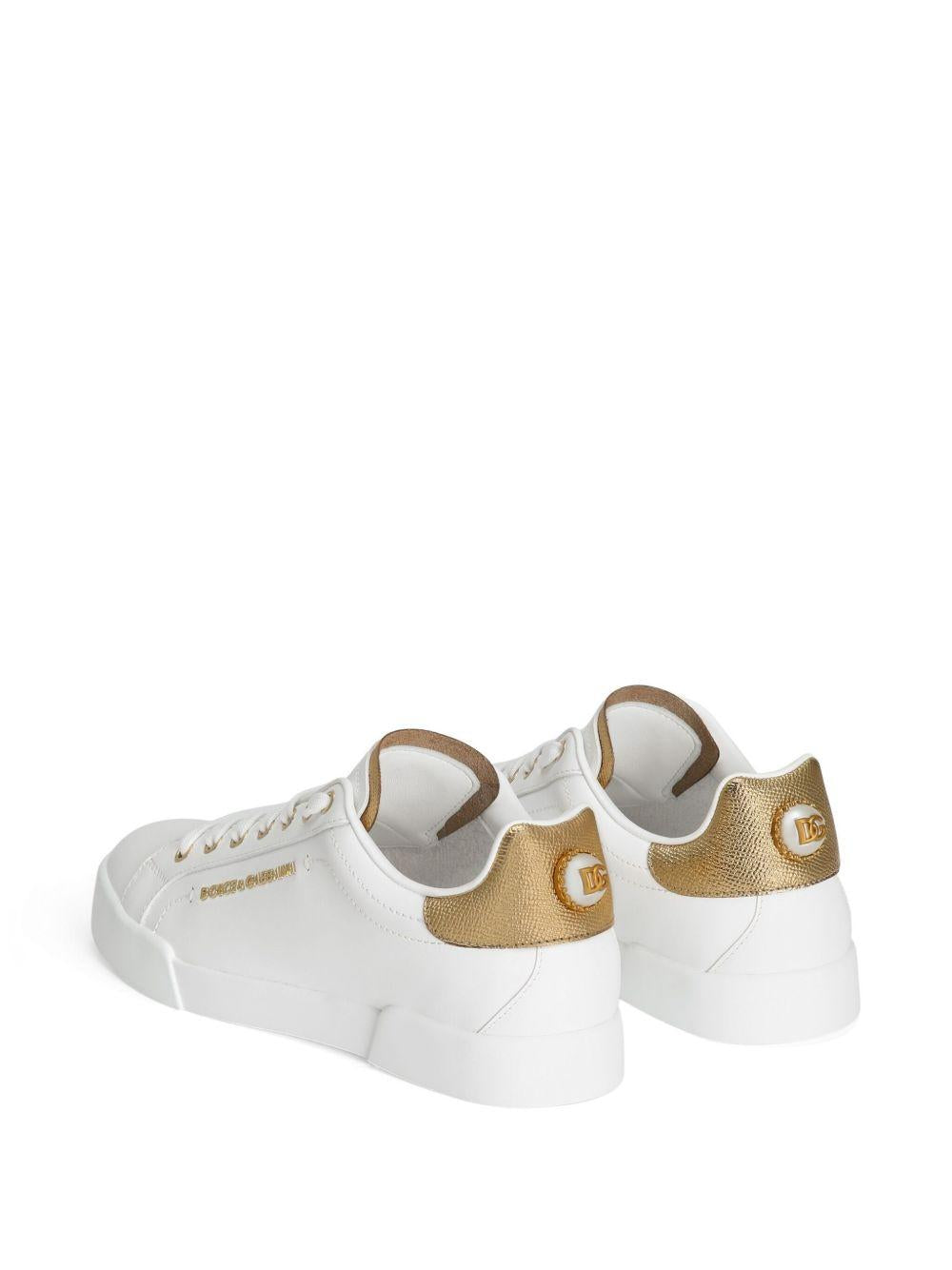 DOLCE e GABBANA Sneakers Portofino in pelle bianca e oro