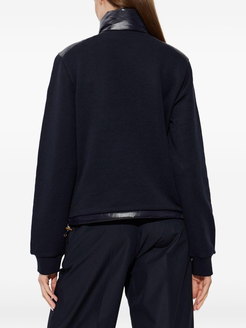 MONCLER Giacca piumino nero imbottito con tasche