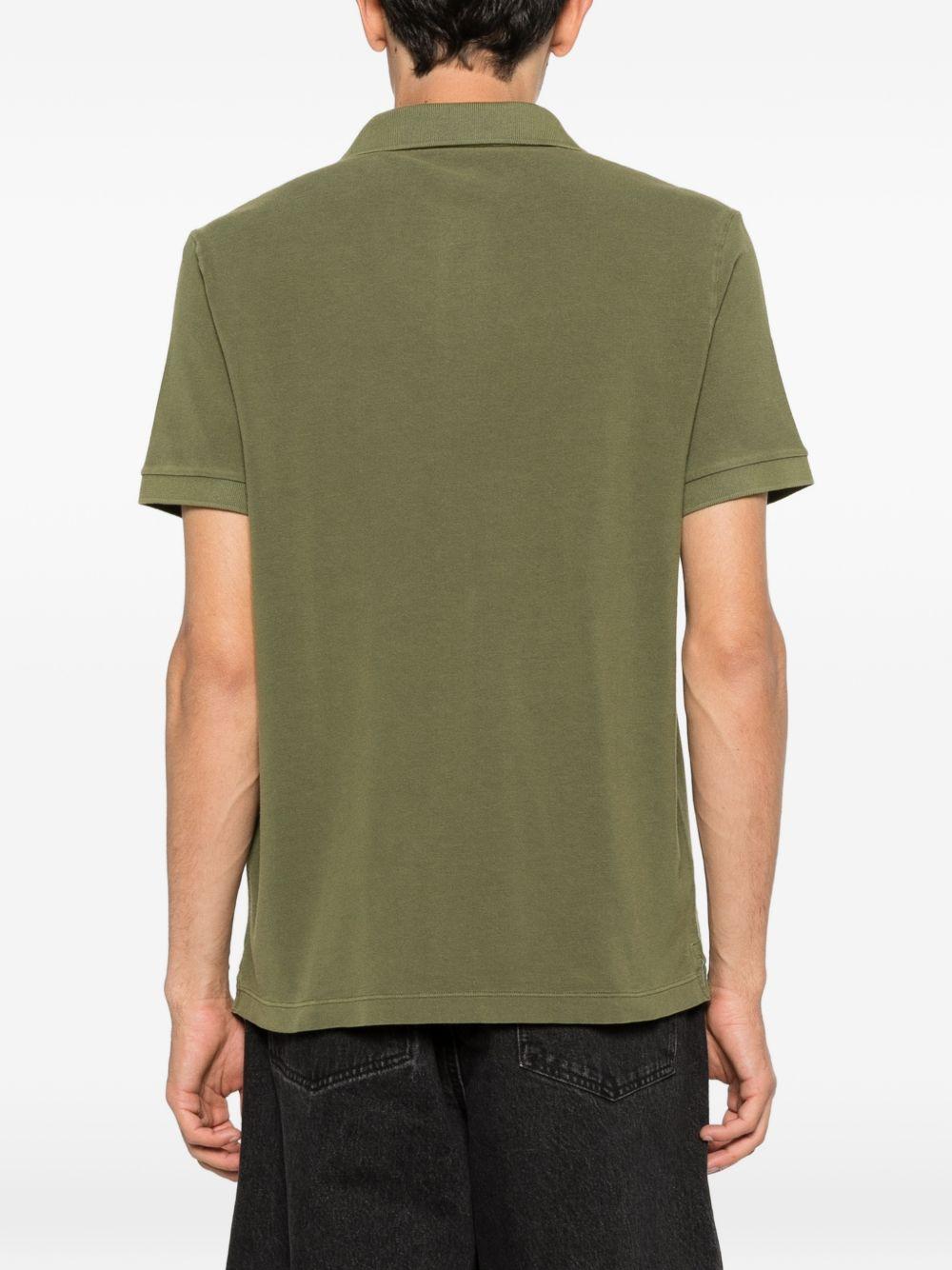 STONE ISLAND Polo in cotone verde con logo e maniche corte