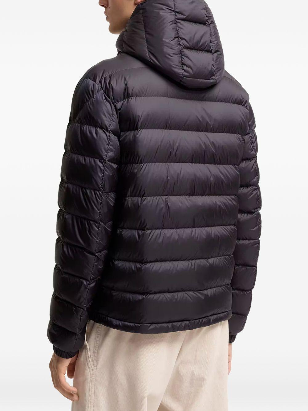 MONCLER Piumino blu Verith con cappuccio e tasche multifunzione
