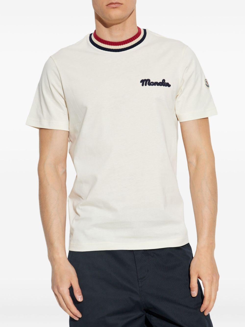 MONCLER T-shirt in cotone bianco con colletto rigato e logo