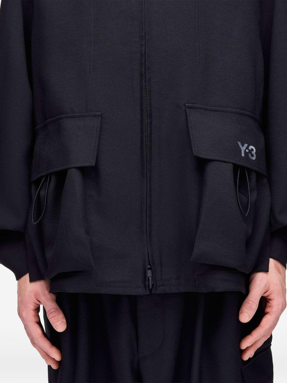Y3 Giacca nera in tessuto tecnico con tasche frontali