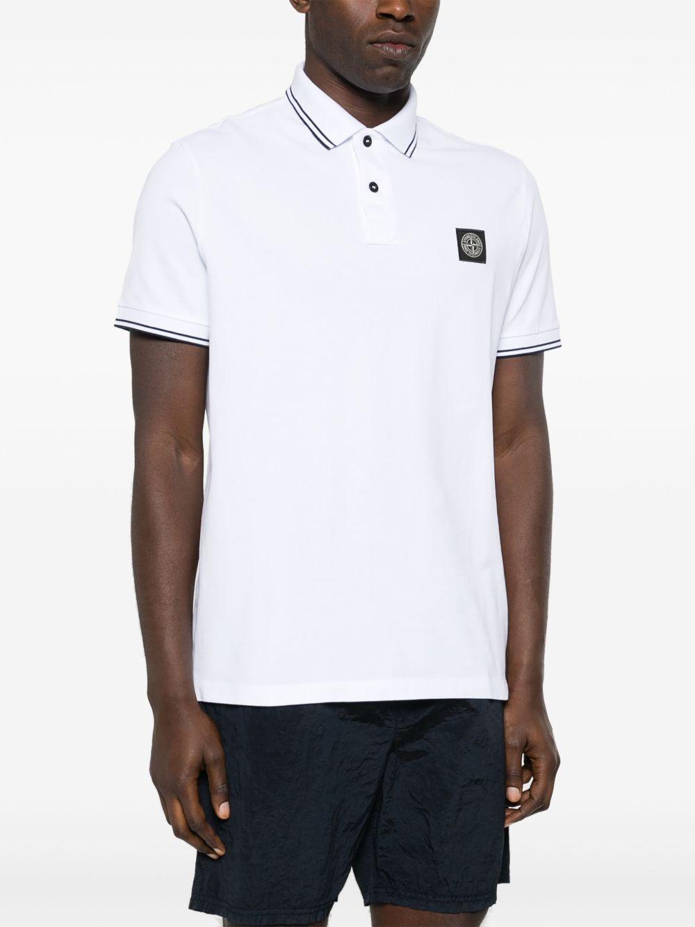 STONE ISLAND Polo in cotone bianco con logo