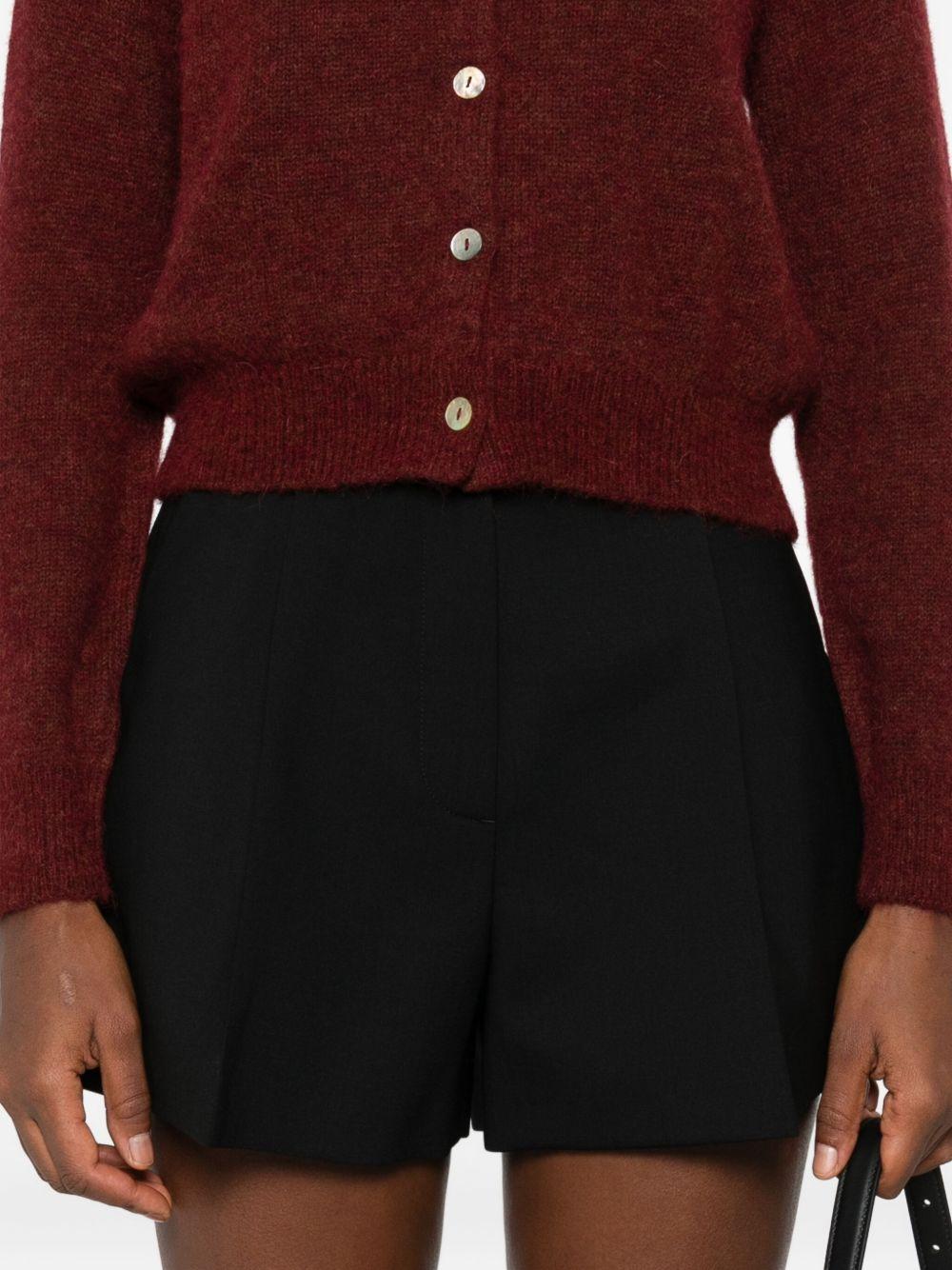 MSGM Shorts con pieghe e rifiniture in raso