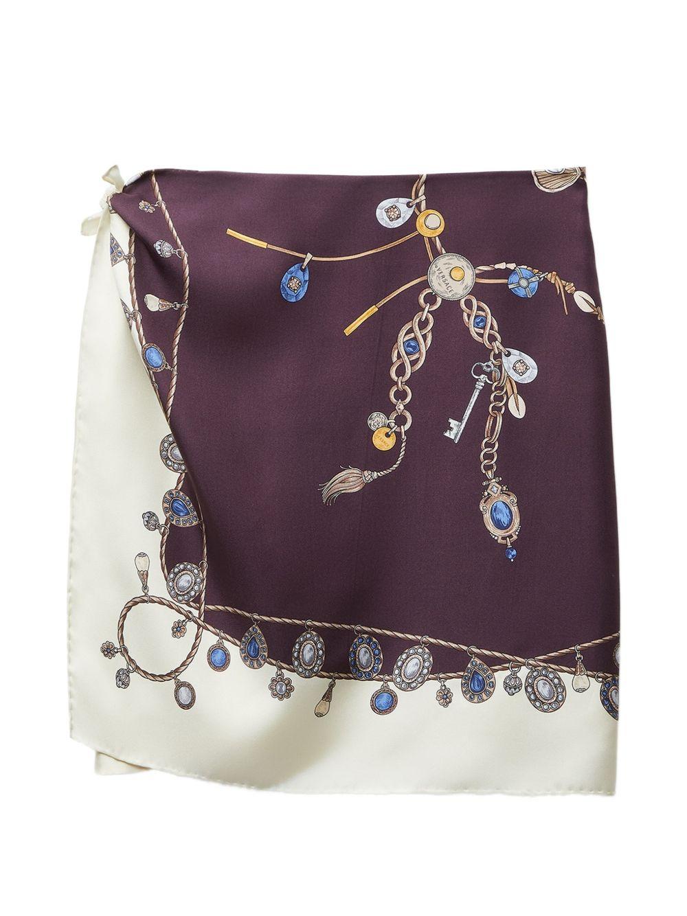 VERSACE Gonna in seta avorio e bordeaux con stampa multicolor