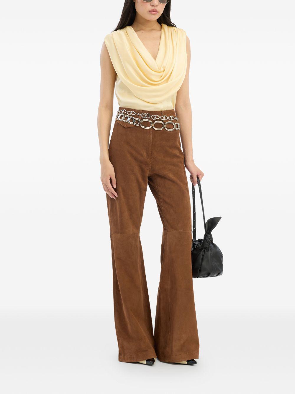 ROTATE Top giallo senza maniche con zip