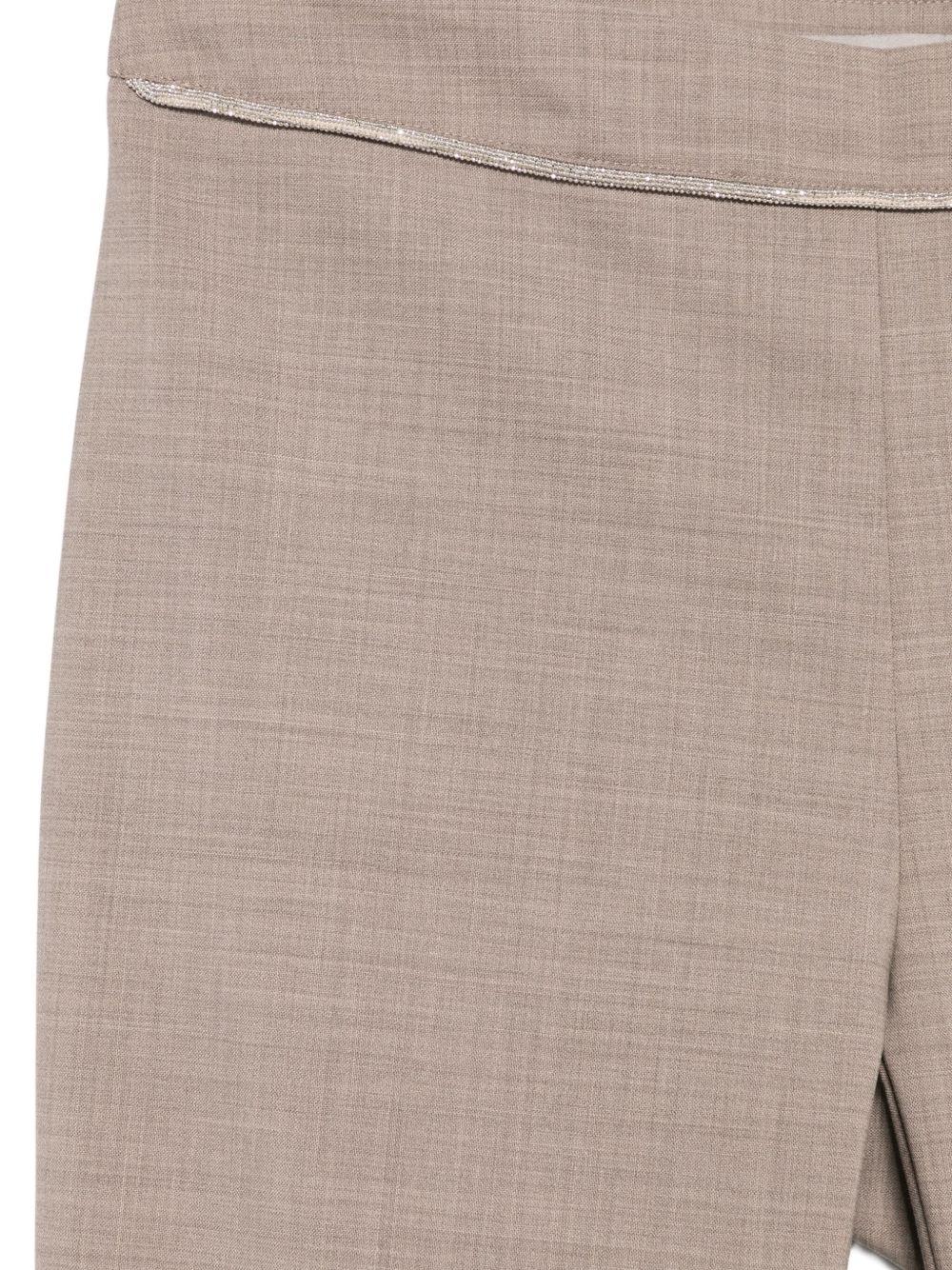 D EXTERIOR Pantaloni beige a gamba svasata