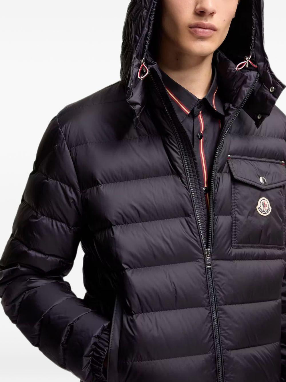 MONCLER Piumino blu Verith con cappuccio e tasche multifunzione
