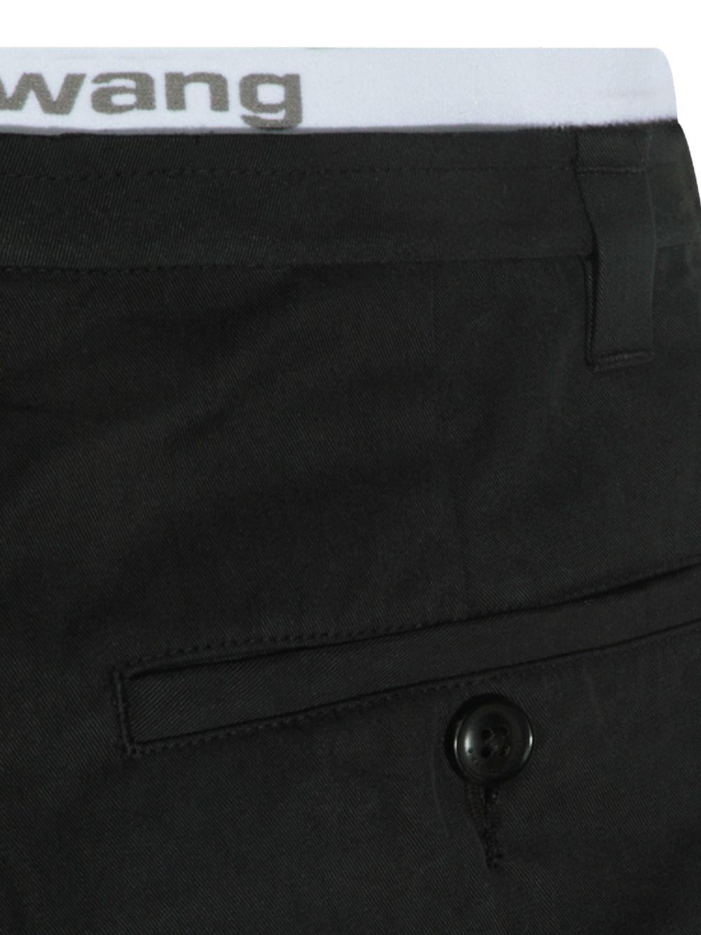 ALEXANDER WANG Pantaloncini plissettati neri in misto cotone con logo