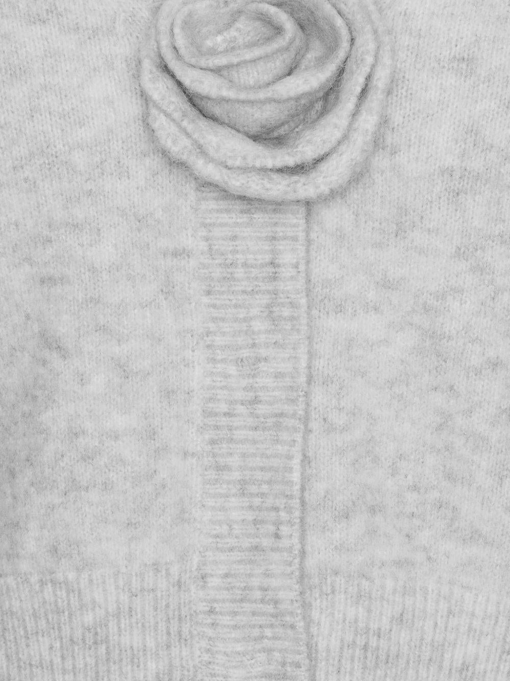 ROTATE Cardigan grigio con rosa applicata