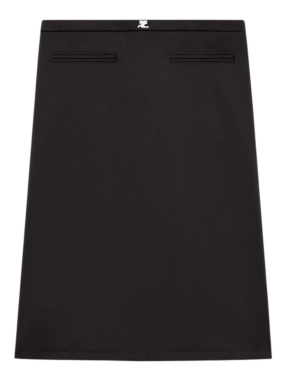 COURREGES Gonna nera con mini tasche frontali