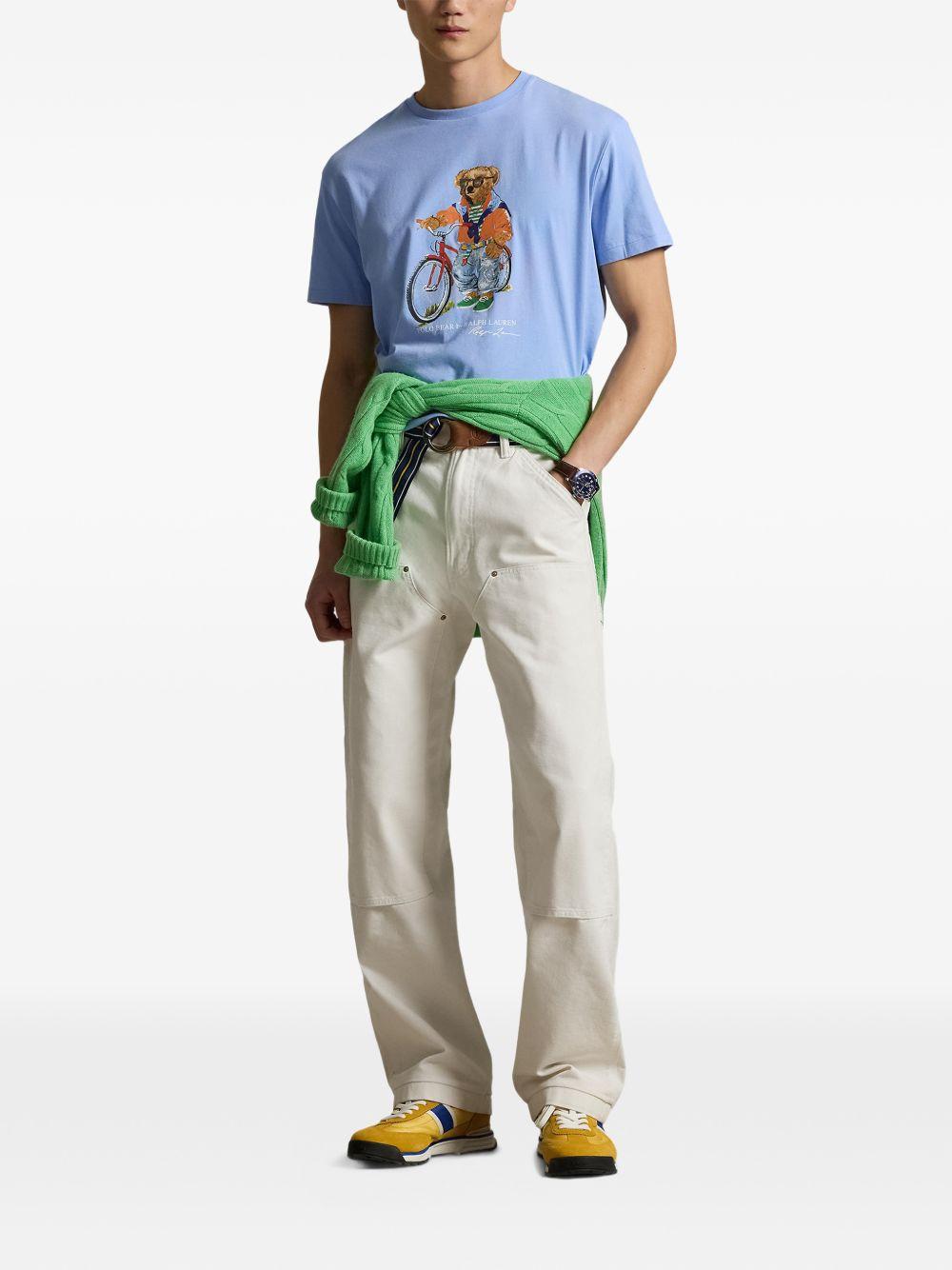 POLO RALPH LAUREN T-shirt celeste con illustrazione grafica centrale