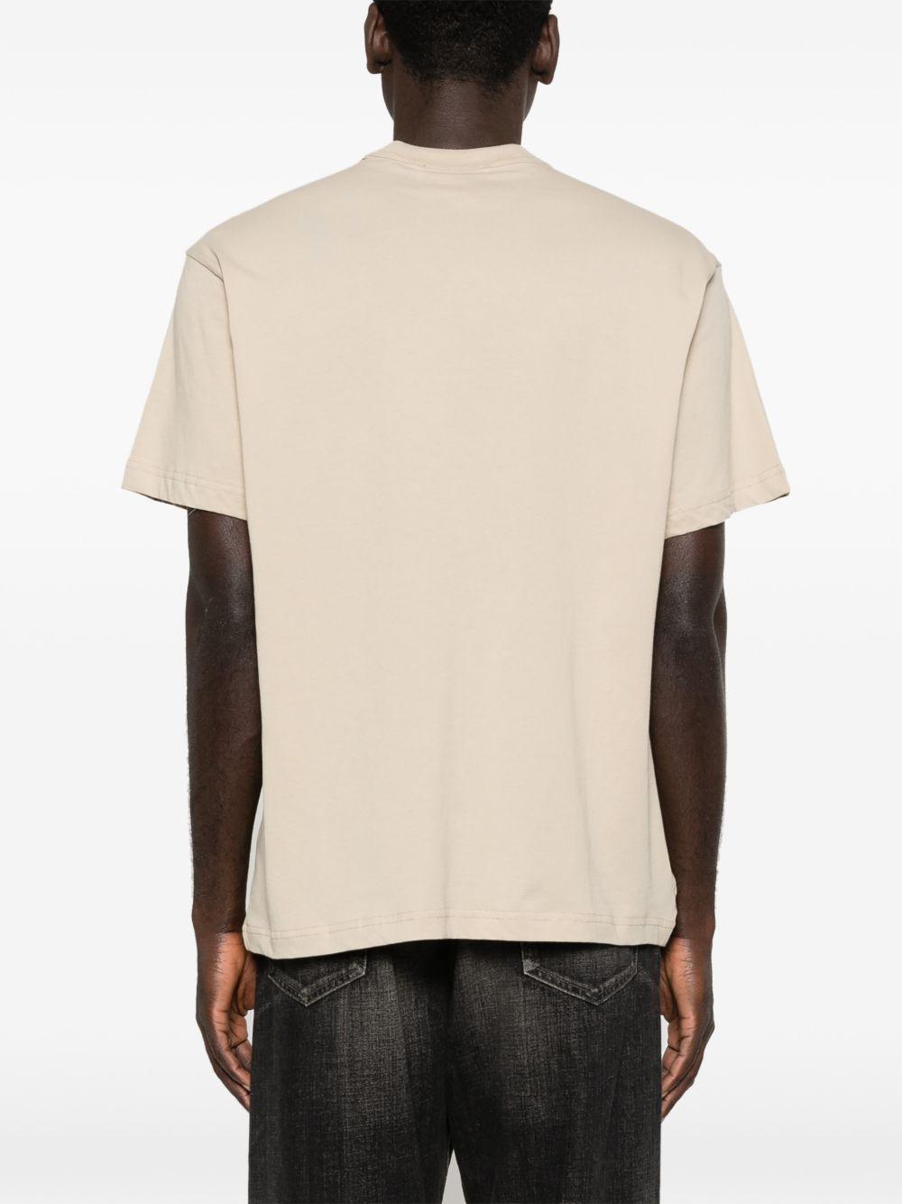 VERSACE JEANS COUTURE T-shirt in cotone a maniche corte beige con stampa