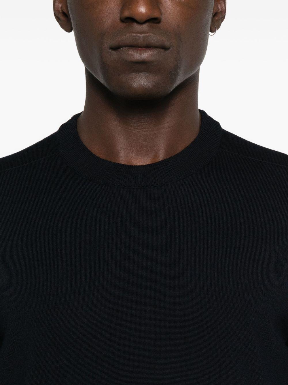 STONE ISLAND Maglia girocollo blu in lana con logo applicato