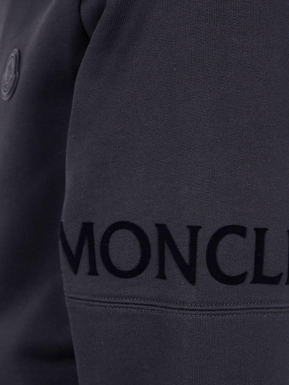 MONCLER Felpa nera in cotone con chiusura a zip