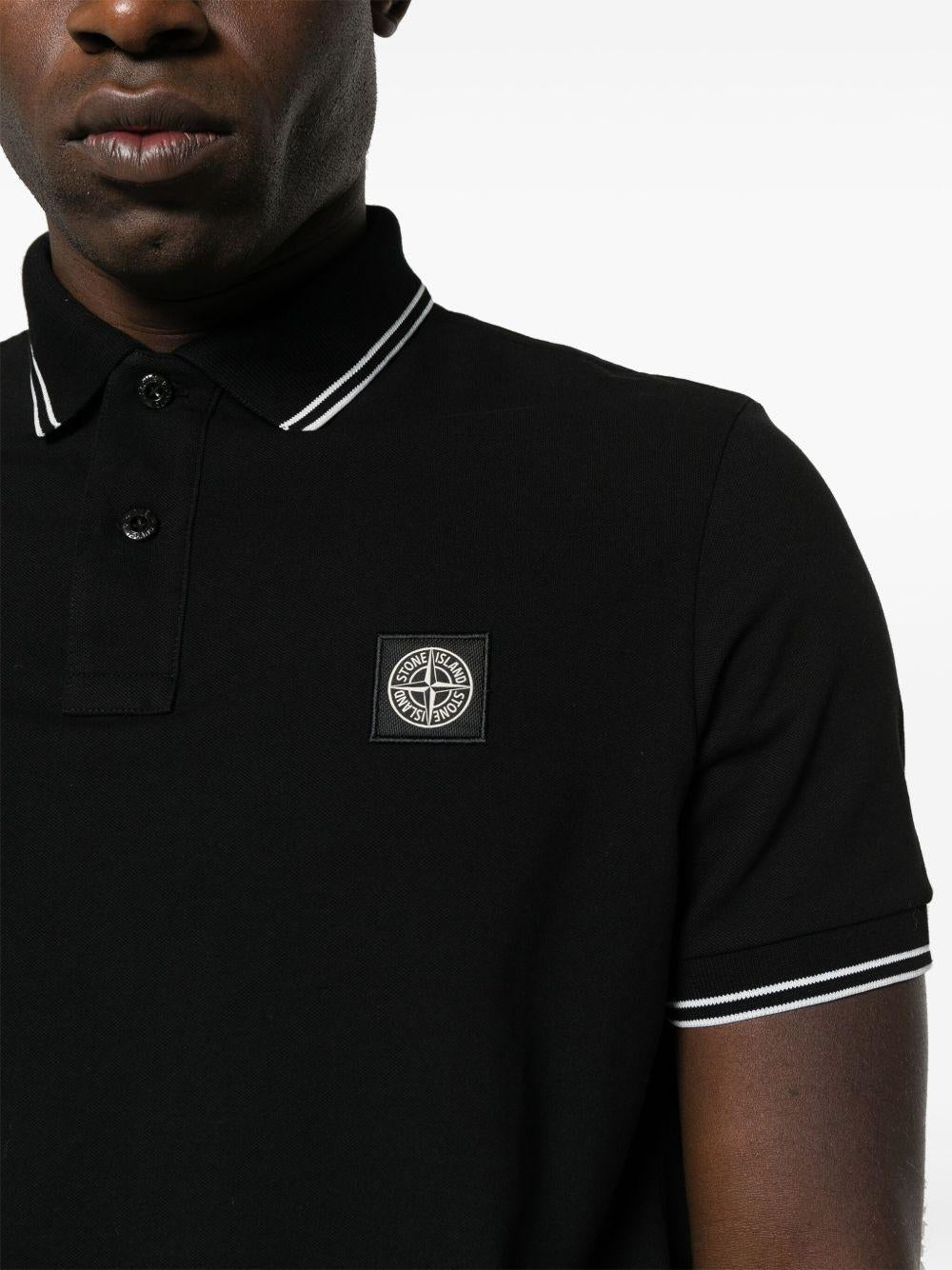 STONE ISLAND Polo in cotone nero con logo