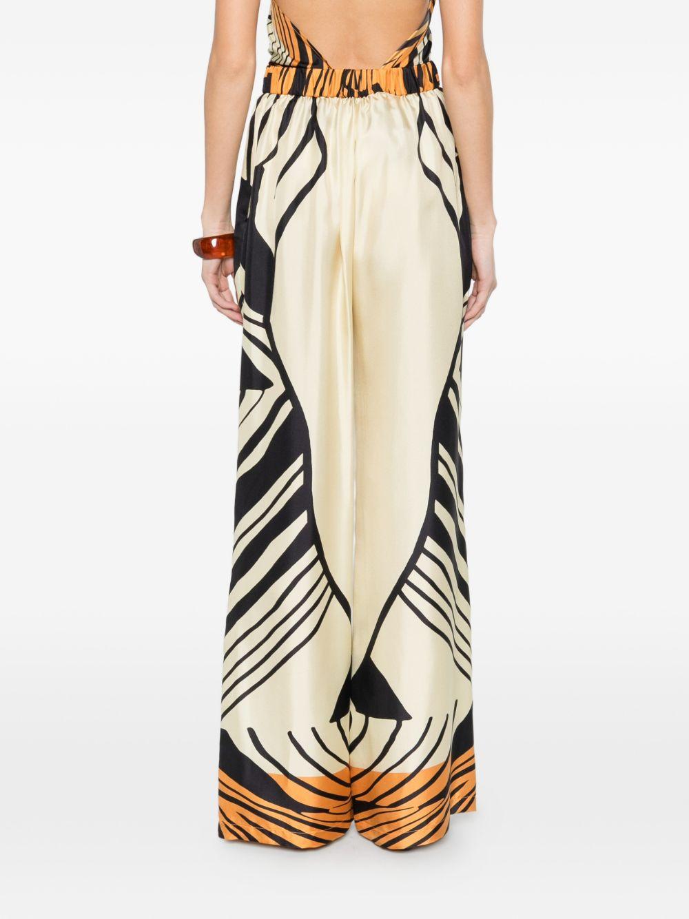 RAQUEL DINIZ Pantaloni con motivo astratto in seta avorio, nero, arancione