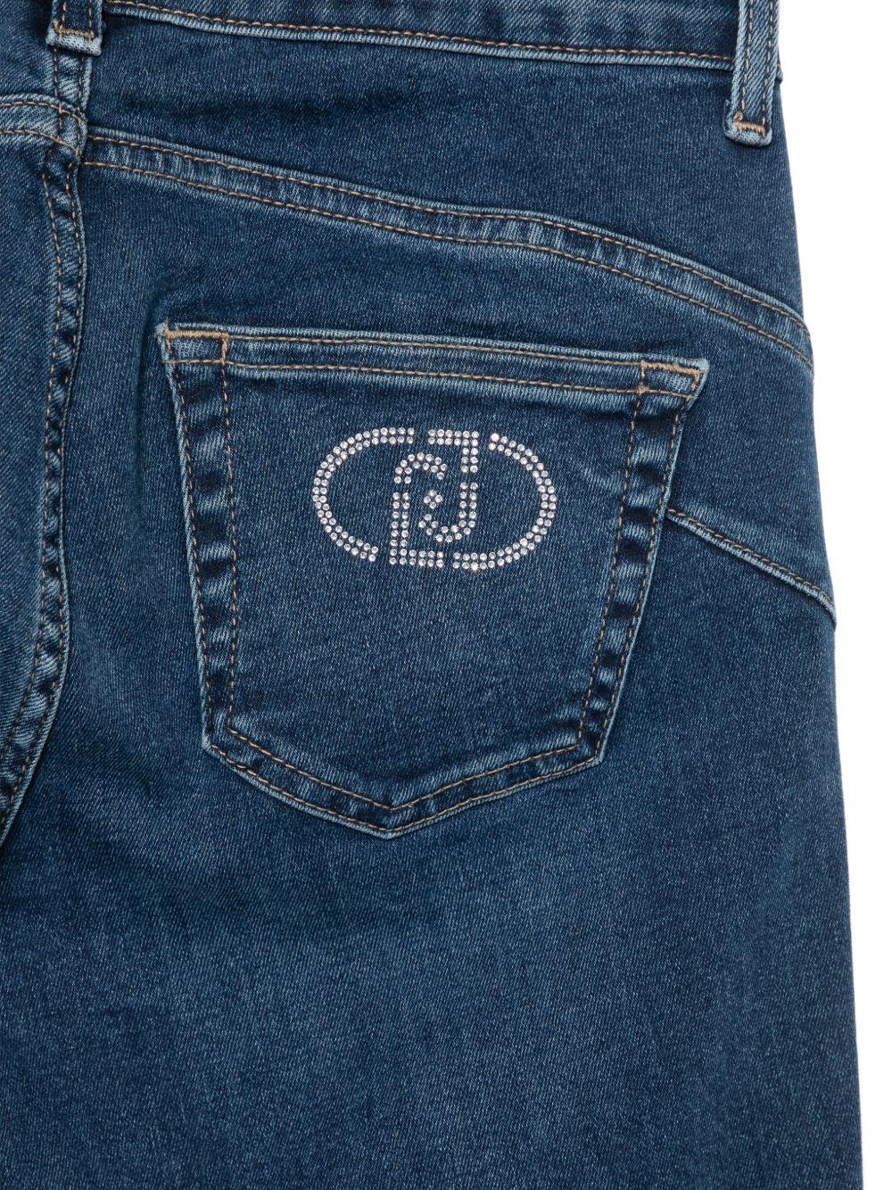 LIUJO Jeans blu a gamba leggermente svasata