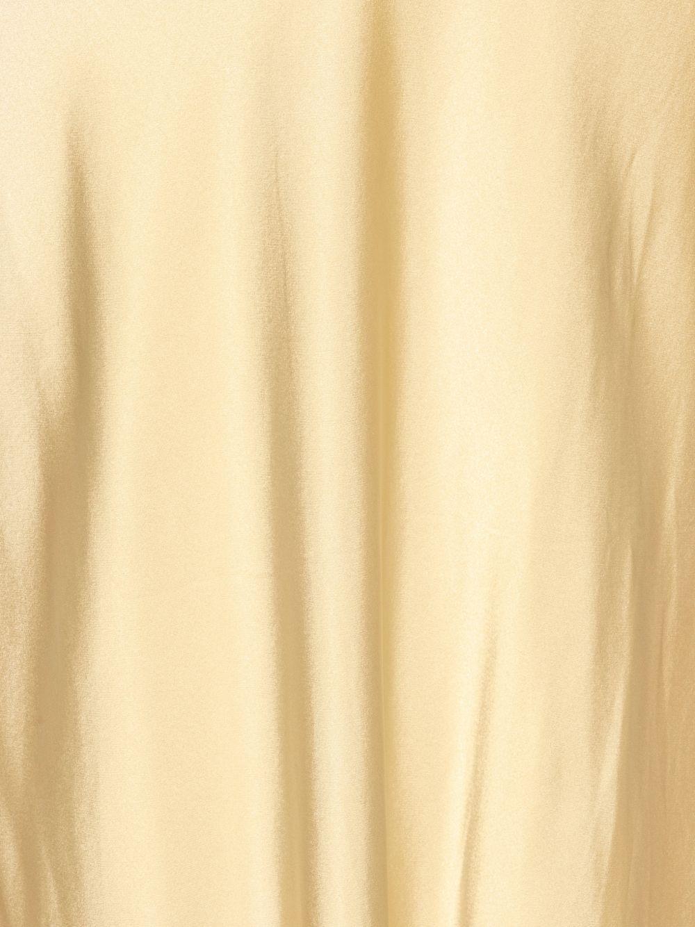 ROTATE Abito lungo giallo con schiena scoperta