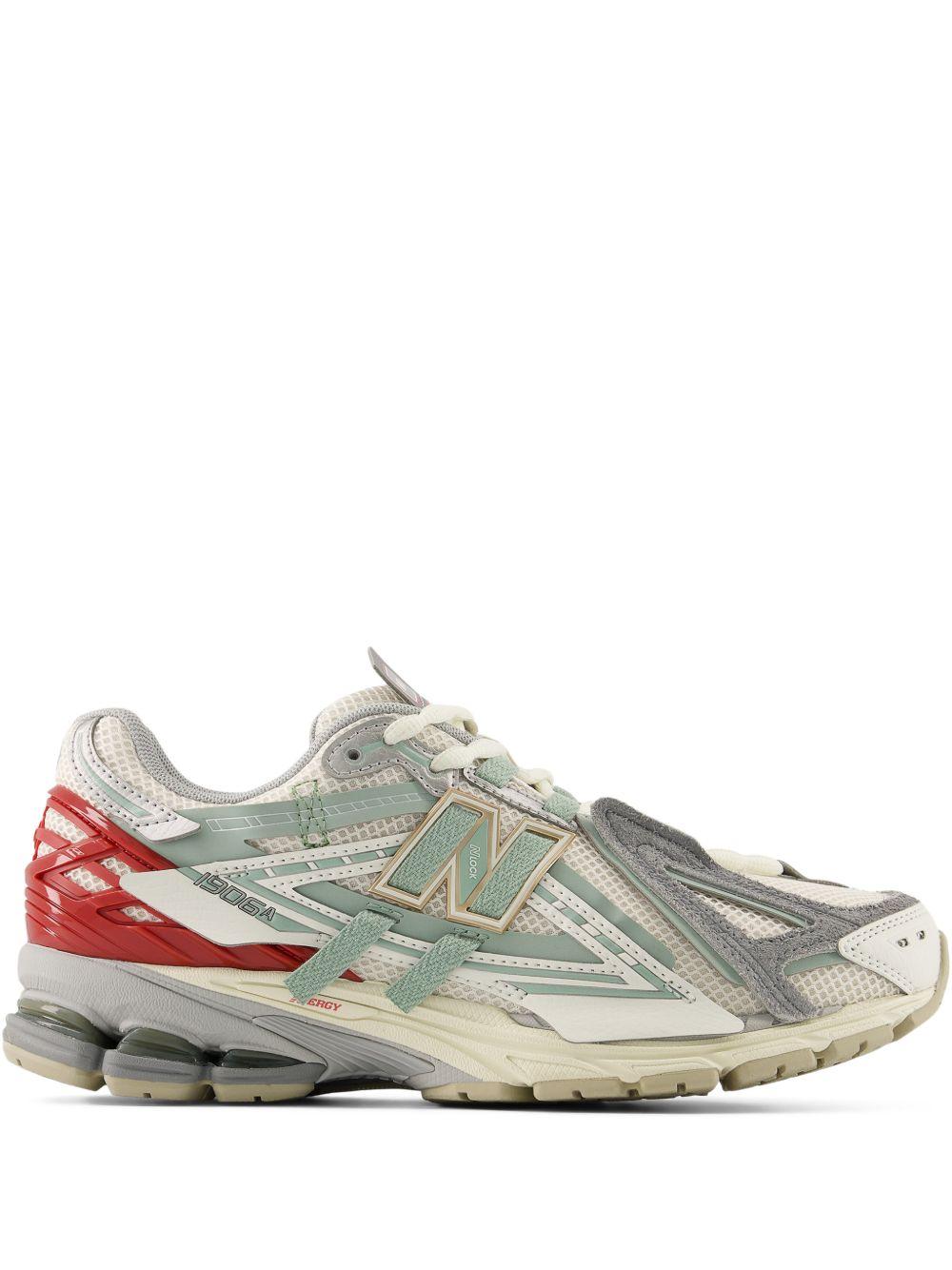NEW BALANCE Sneakers 1906 bianche grigie e rosse