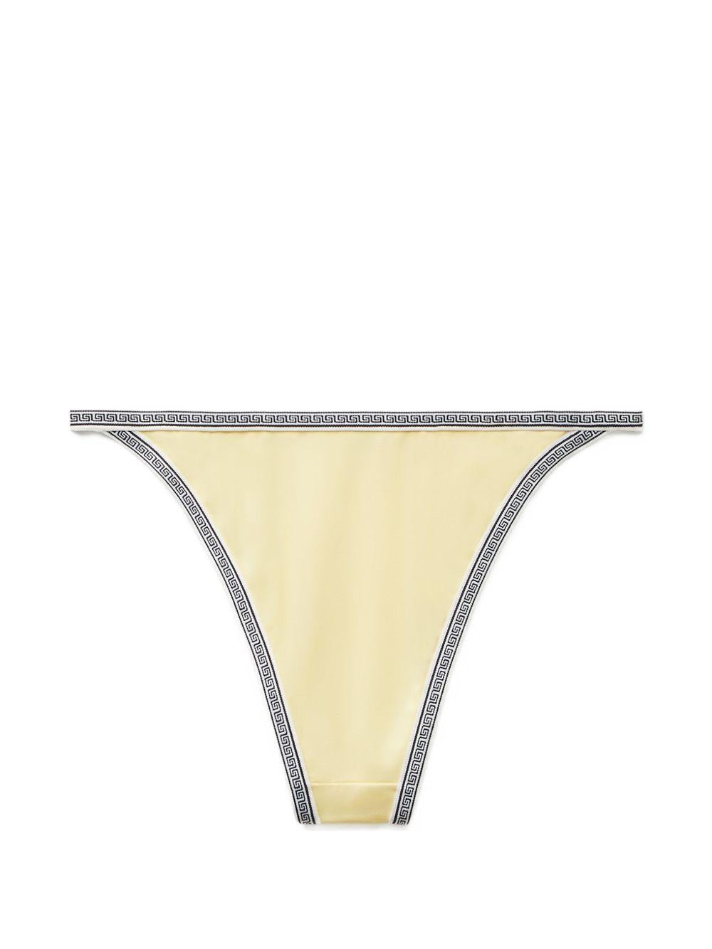 VERSACE Slip bikini giallo con bordo geometrico e logo