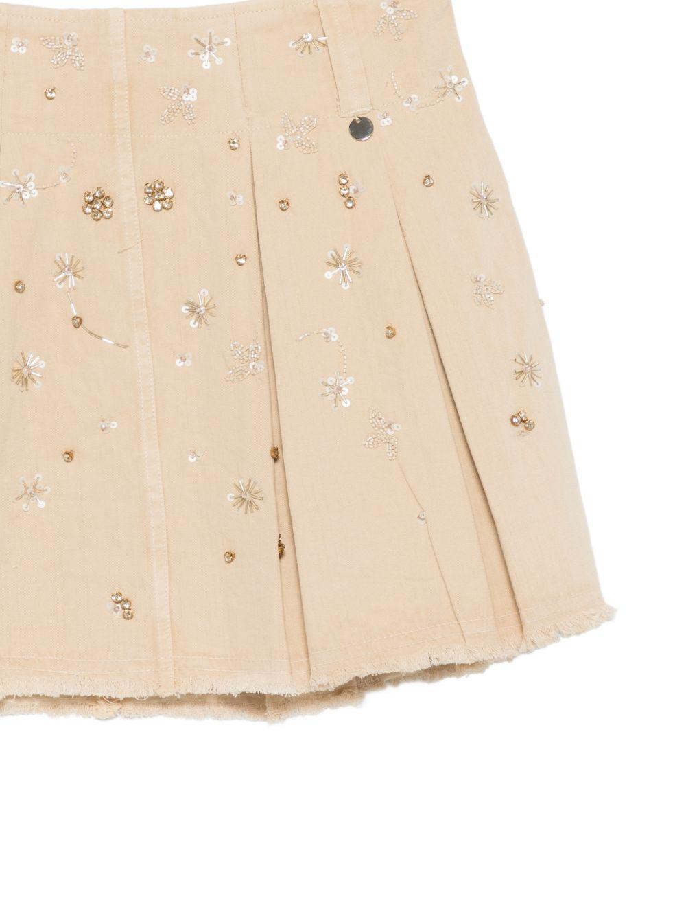 LIUJO Gonna corta in cotone beige con strass