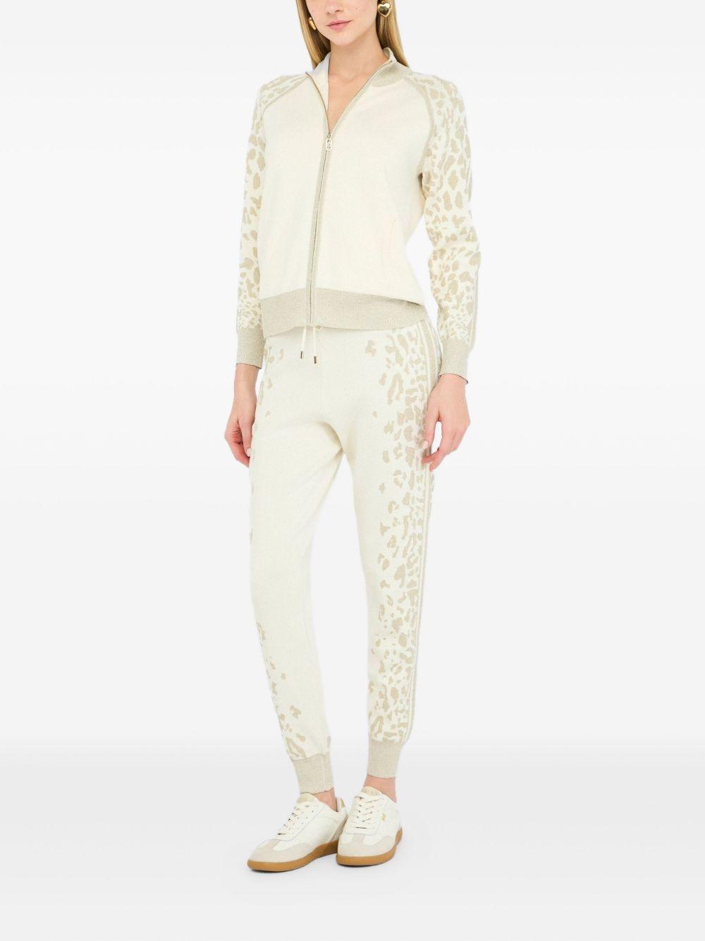 LIUJO Maglia con zip a collo alto bianco e oro