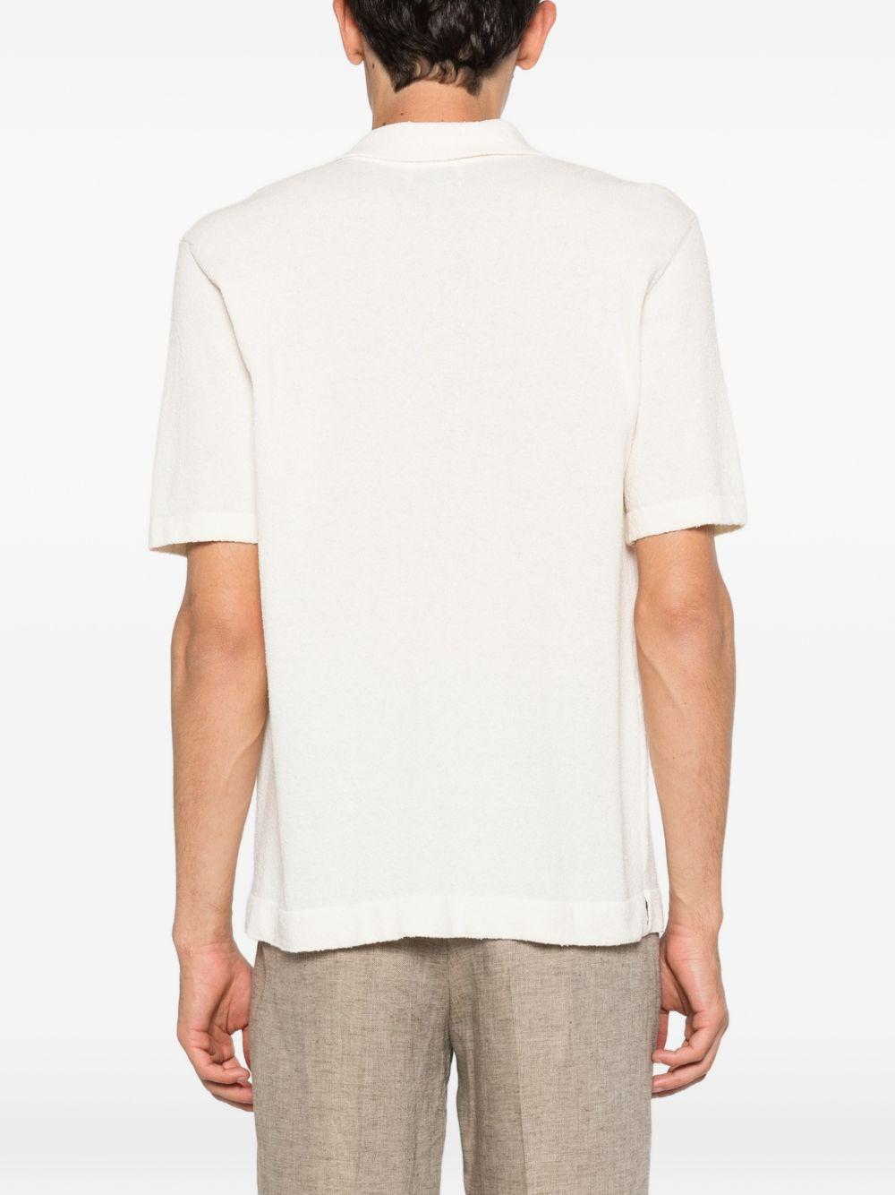 SCAGLIONE Polo in cotone bianco a maniche corte